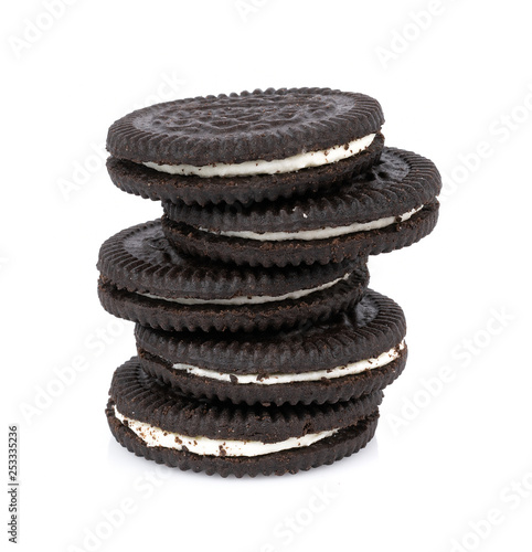 sandwich cookies with cream on white background