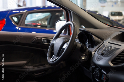 Interior of new car at dealer showroom. Modern transportation. © tikhomirovsergey