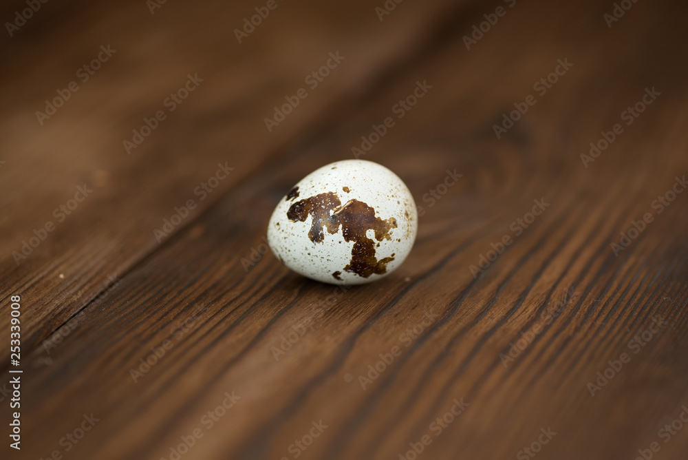 quail egg on wooden background close-up quail egg on wooden background close-up