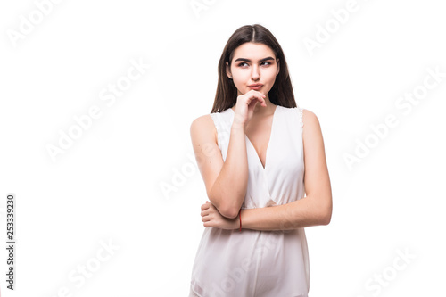 Young beautiful woman thinking looking to the side at blank copy space isolated over white background © dianagrytsku