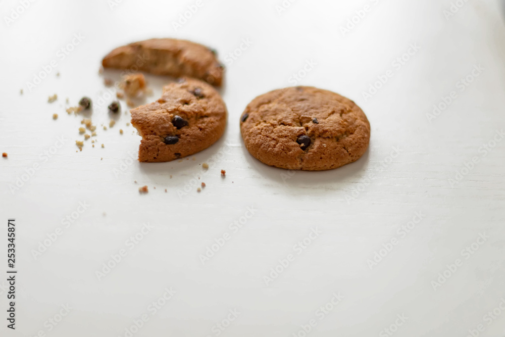 oatmeal cookies with chocolate chips on white table oatmeal cookies with chocolate chips on white table