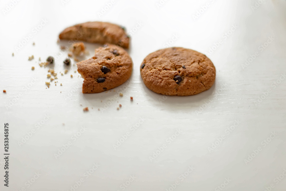 oatmeal cookies with chocolate chips on white table oatmeal cookies with chocolate chips on white table
