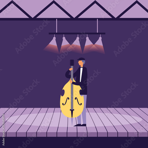 musician man with cello on stage