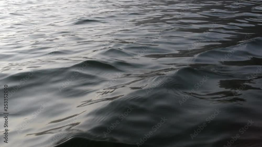 Small rolling waves on a lake. Small rolling waves on a lake.