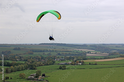 Paraglider flying at Monks Down