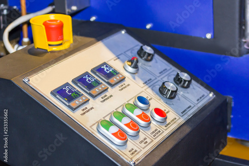 close up modern of control panel box and many switch for industrial food machine photo