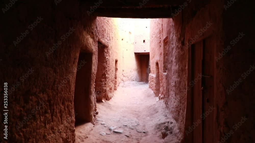 Slowly walking forwards through a Berber Village in Morocco, with Clay walls. Slowly walking forwards through a Berber Village in Morocco, with Clay walls.
