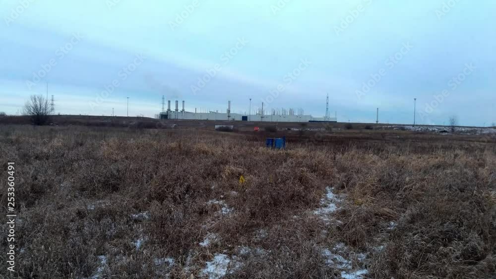 Smokestacks working amidst an open field. Smokestacks working amidst an open field.