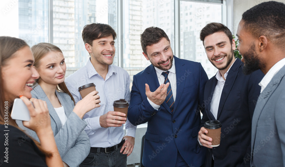 Young business colleagues talking, having coffee break Young business colleagues talking, having coffee break