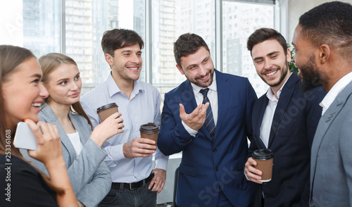 Young business colleagues talking  having coffee break