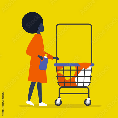 Colourful clothes in a trolley. Self service. Young black female character rolling a laundry cart. Laundromat. Detergent. Daily chores concept.
