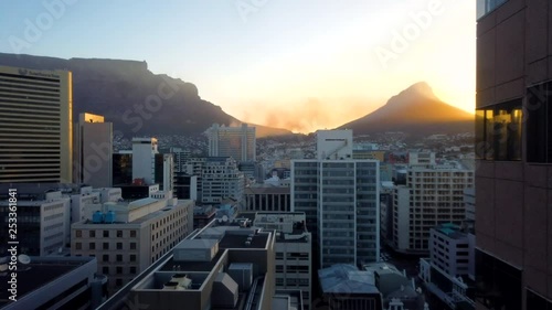 A motion timelapse of Cape Town's skyline with Table Mountain and Lion's Head in the background.