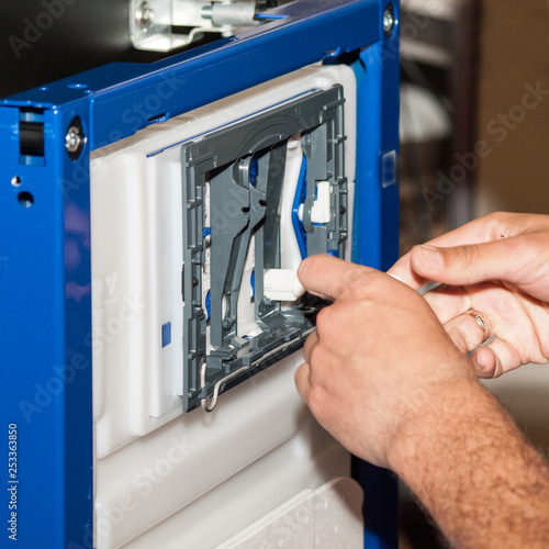 Assembly and installation of parts on the panel. photo