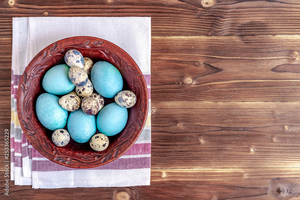 Easter composition with eggs on wooden background. Top view, copy space. Easter composition with eggs on wooden background. Top view, copy space.