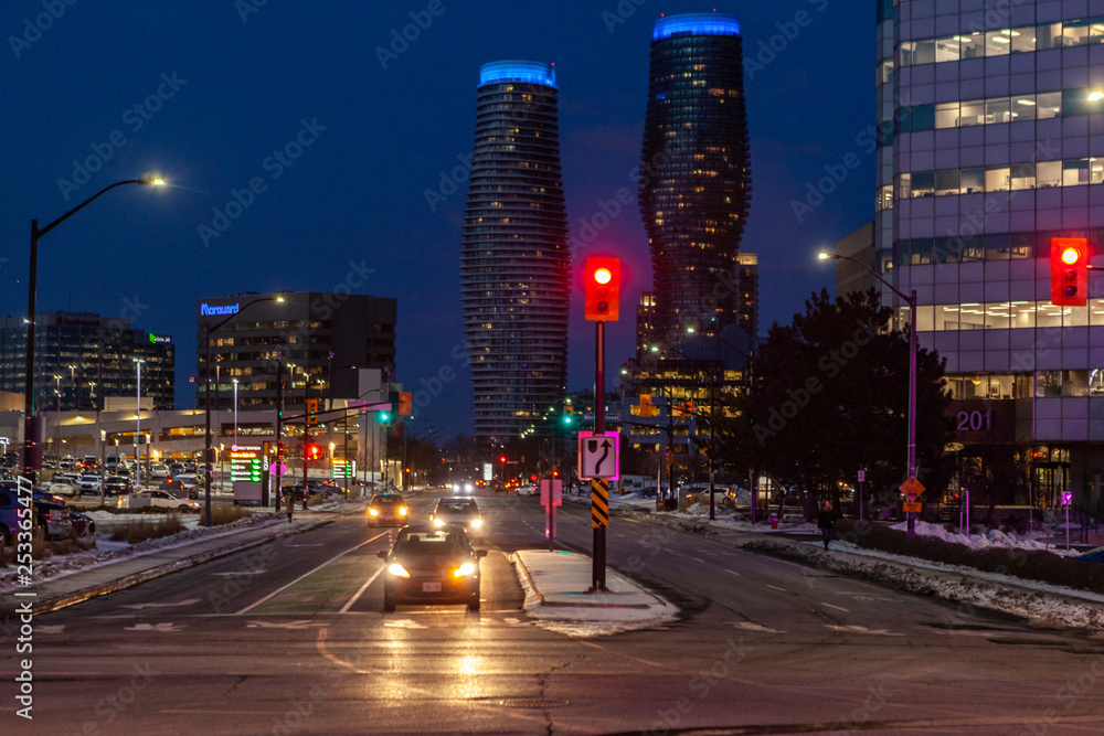Mississauga, Canada, February 14, 2019: Twin towers of Absolute Condos in, these high-rise Mississauga condos were built in 2007 by Fernbrook Homes. Located in Mississauga's City Centre neighbourhood