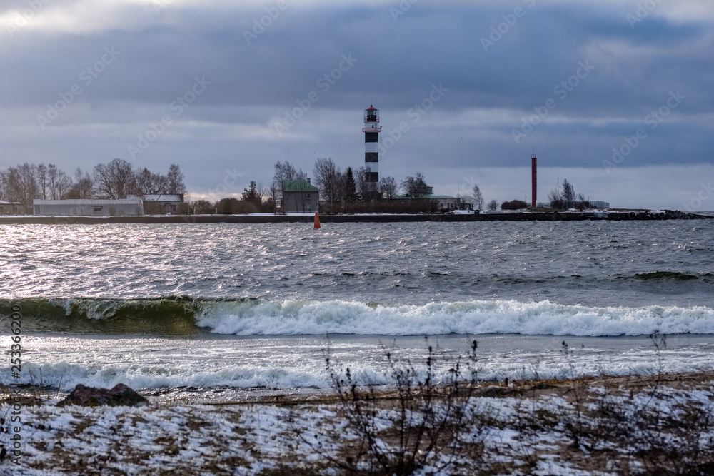 moderate storm in baltic sea near lighthouse moderate storm in baltic sea near lighthouse