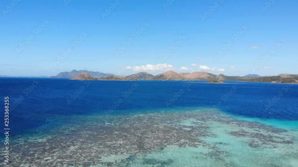 Aerial shot of beautiful islands in Coron, Philippines, pan shot Aerial shot of beautiful islands in Coron, Philippines, pan shot