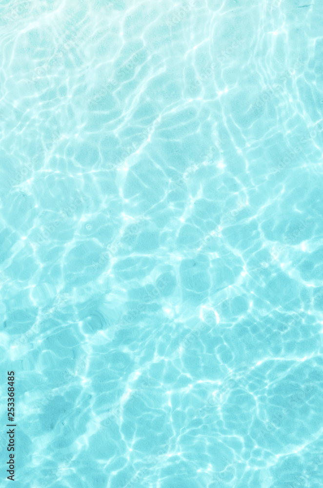 Blue swimming pool. Summer background. Summer vacation.