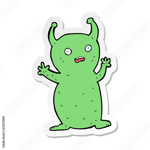 sticker of a cartoon funny little alien