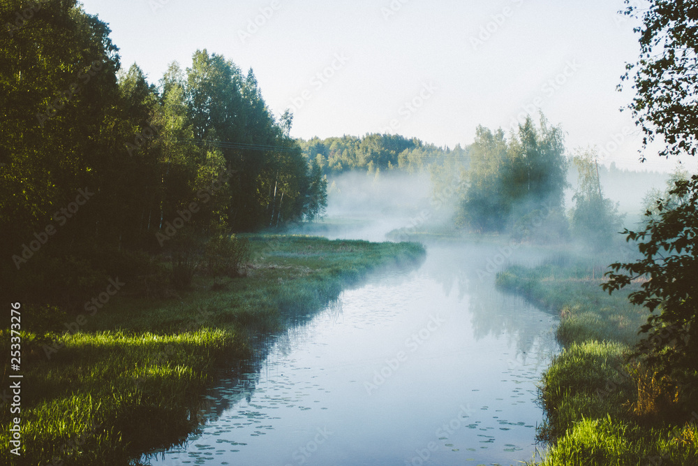 Sunrise fog river