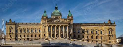 Panorama of the Federal Administrative Court Leipzig - Germany at blue sky.At the courthouse is the text Federal Administrative Court in German