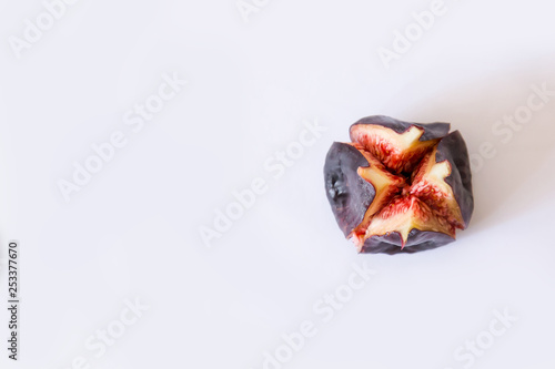 ripe figs on a white background