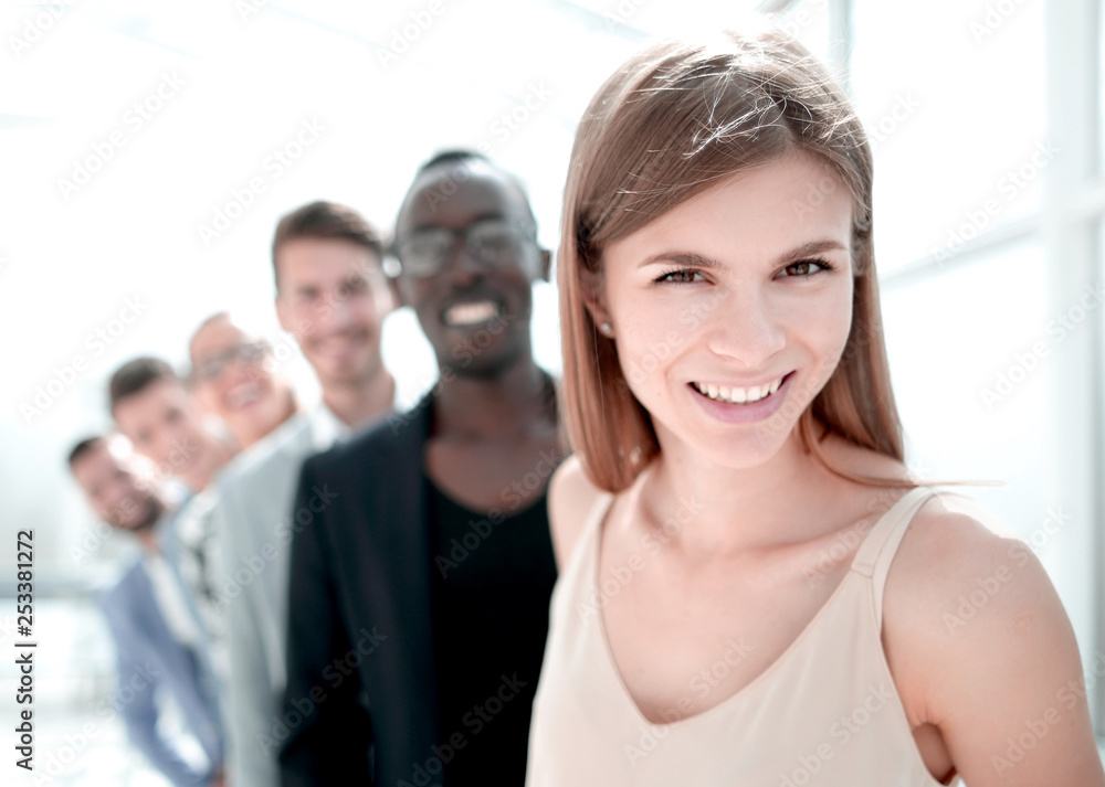 multiethnic corporate business people standing on office looking at camera smiling multiethnic corporate business people standing on office looking at camera smiling