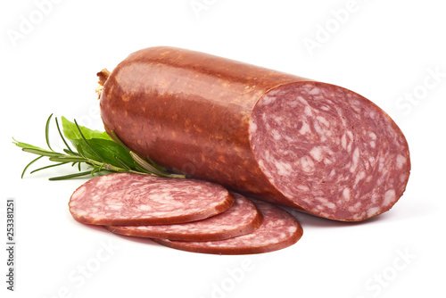 Smoked Salami sausage with slices and herbs, isolated on white background. Close-up