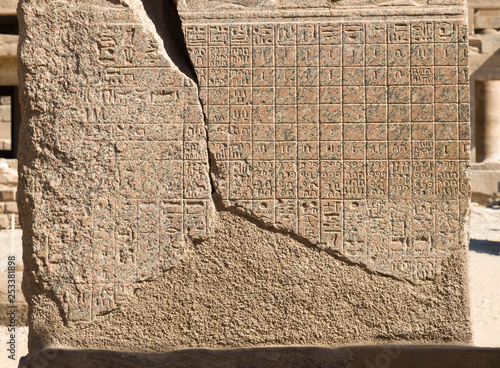 Ancient Egyptian calendar engraved on the stone wall of Temple of Karnak, Luxor, Egypt photo