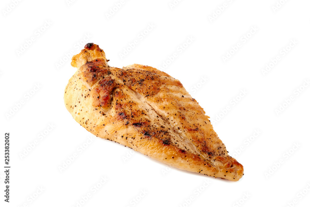 Roasted crispy chicken breast fillet on white Roasted crispy chicken breast fillet on white