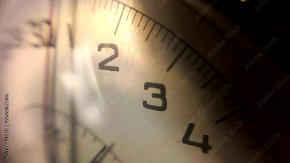 Mechanical stopwatch dial and hand.
Macro close up of stopwatch hand passing through the frame Mechanical stopwatch dial and hand.
Macro close up of stopwatch hand passing through the frame