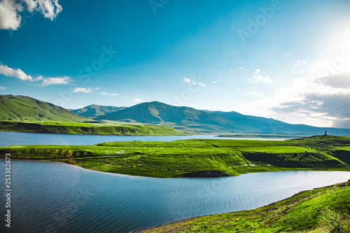 green grass with lake