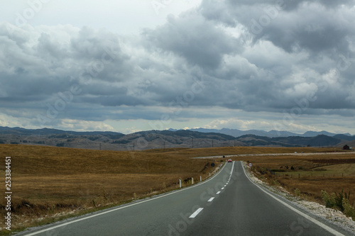 road overlooking the mountains in cloudy weather