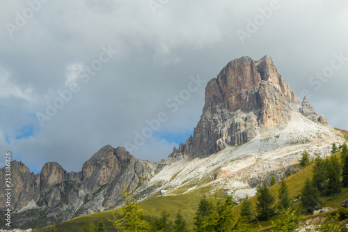 view of Dolomites mountains on a foggy day, South Tyrol © Tomtsya