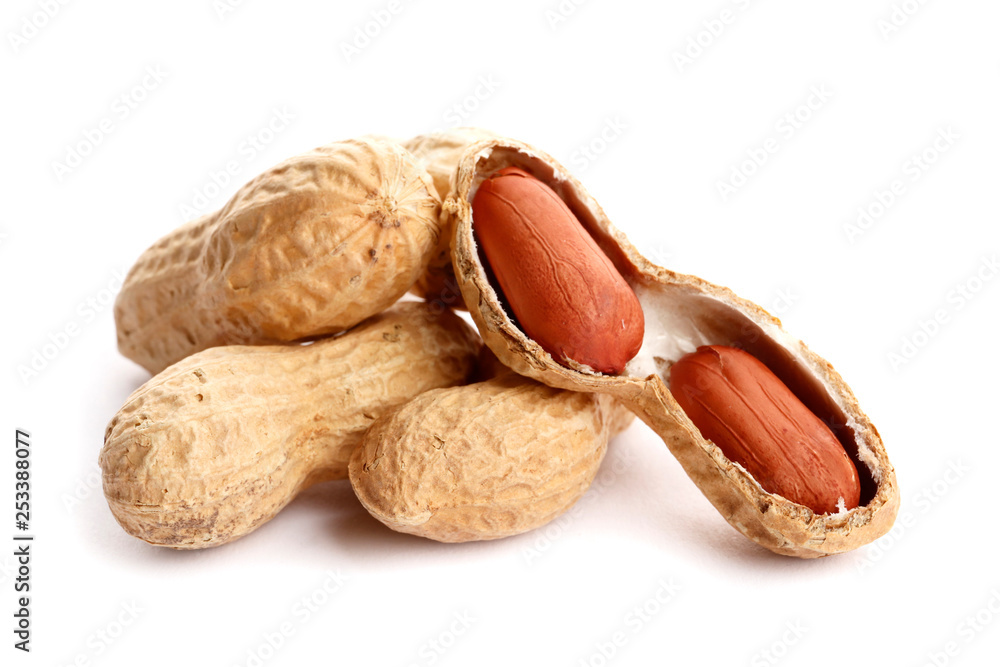 Raw peanuts on white background. Healthy snack ona white background. Top view. close-up. Raw peanuts on white background. Healthy snack ona white background. Top view. close-up.