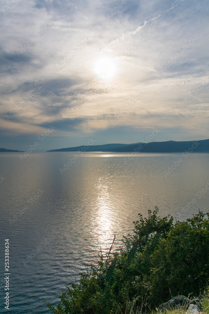 sunset over croatias mediterranean cliffs, ocean view sunset over croatias mediterranean cliffs, ocean view