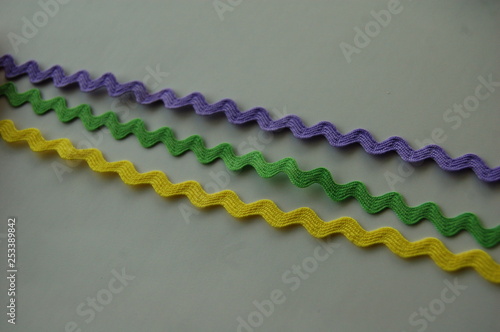 lines of pastel ric rac on white background