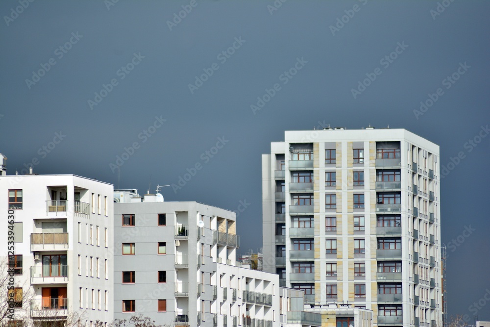 Modern condo building with huge windows