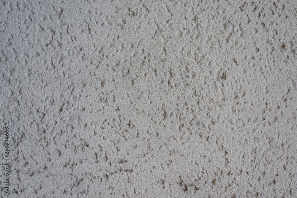 Obraz premium Graue Wand mit Rohputz