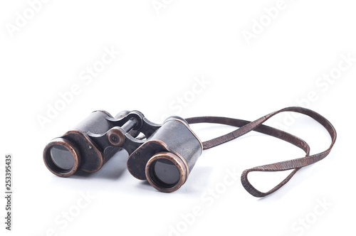 Vintage binoculars on a white background, isolate