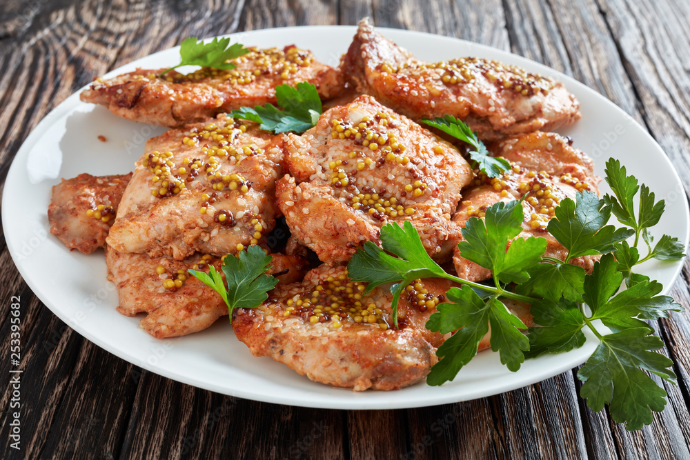 chicken staeks on a plate, top view chicken staeks on a plate, top view