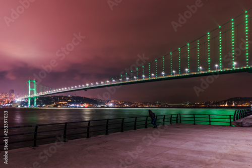 Istanbul Bosphorus Bridge (15th July Martyrs Bridge) with green light. Istanbul, Turkey.. © resul