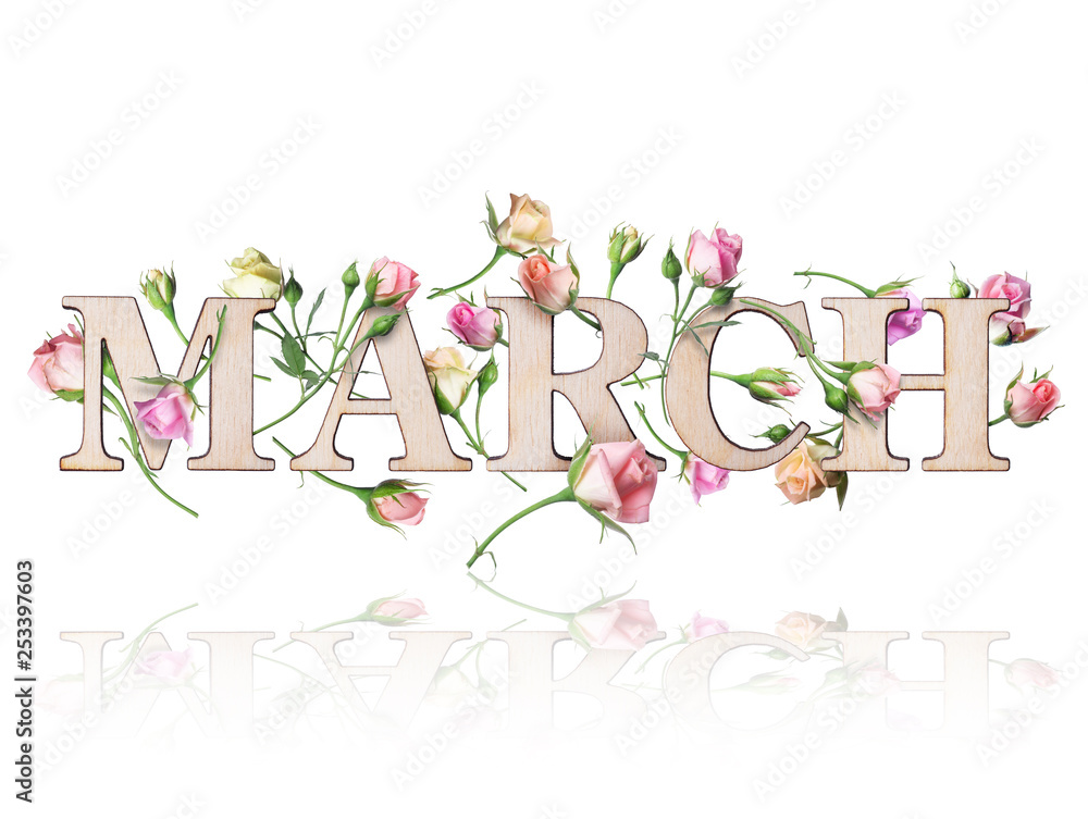 Wooden inscription March with branches of roses, isolated on white background