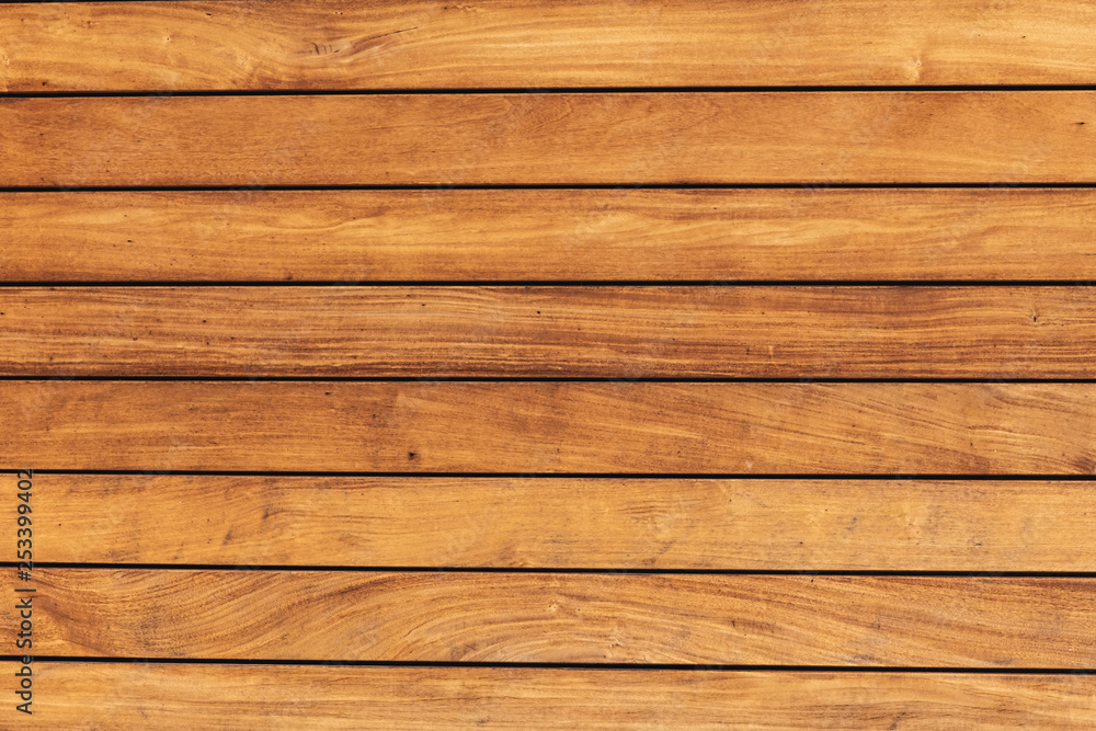 The texture of the pine boards. Horizontal wooden fence. The texture of the pine boards. Horizontal wooden fence.