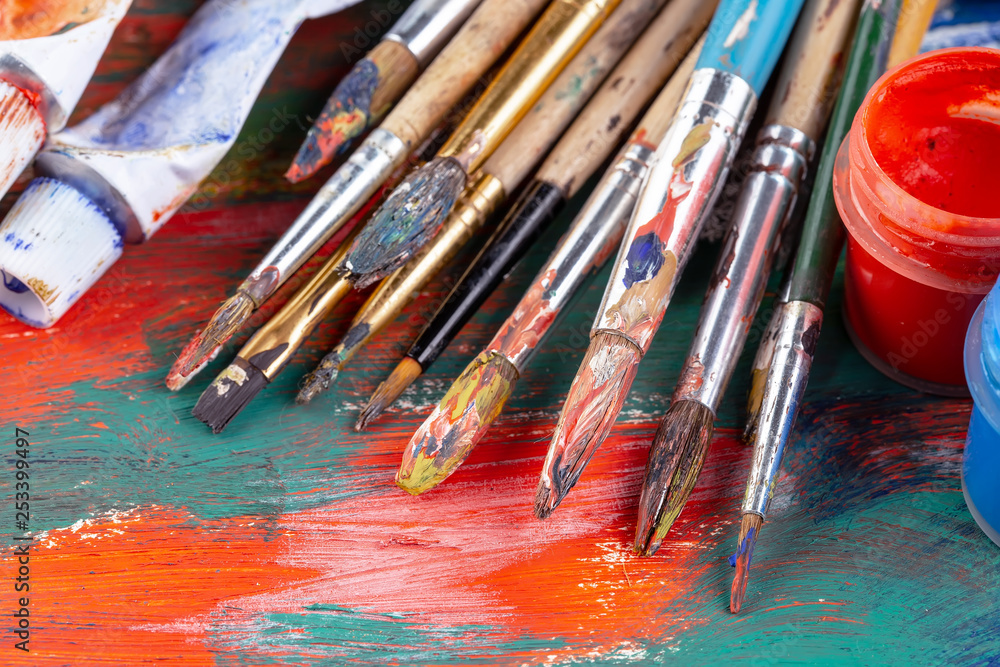 Fototapeta premium Paint brushes and paints for drawing.