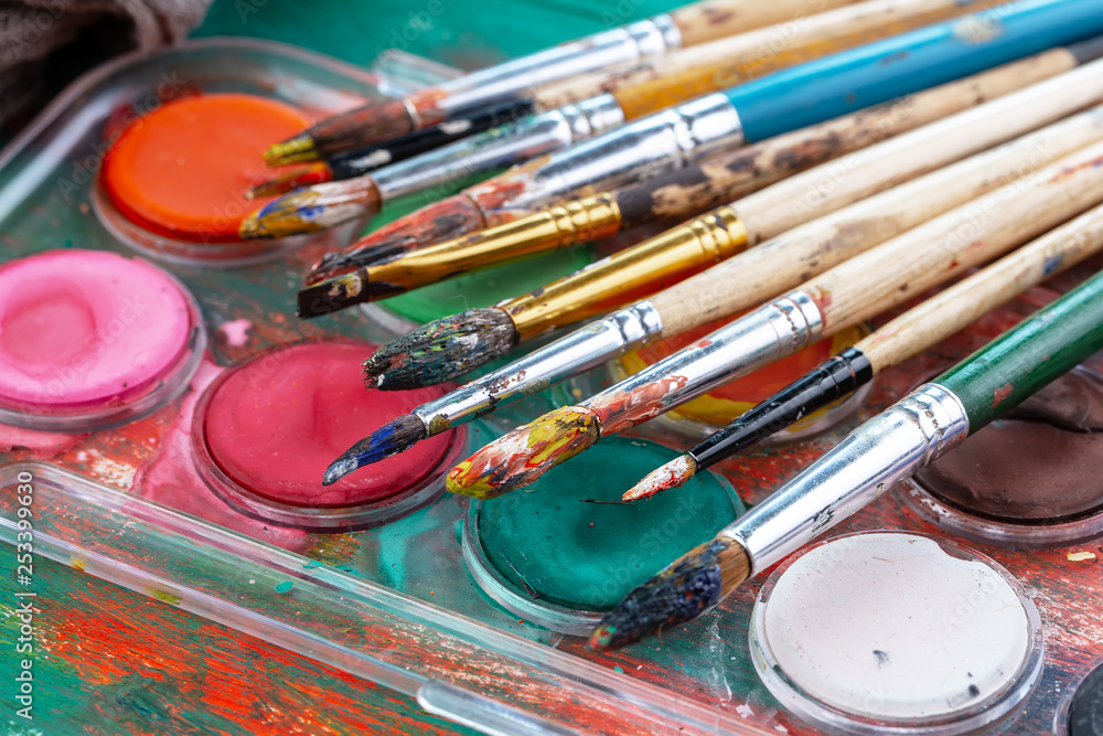 Paint brushes and paints for drawing. Paint brushes and paints for drawing.