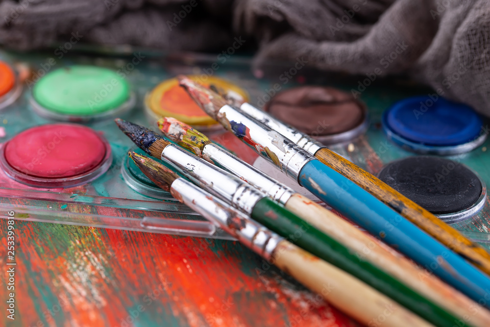Fototapeta premium Paint brushes and paints for drawing.