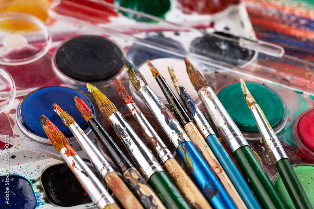 Paint brushes and paints for drawing. Paint brushes and paints for drawing.