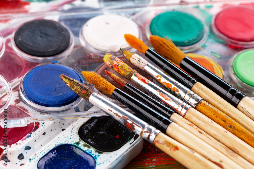 Paint brushes and paints for drawing. Paint brushes and paints for drawing.