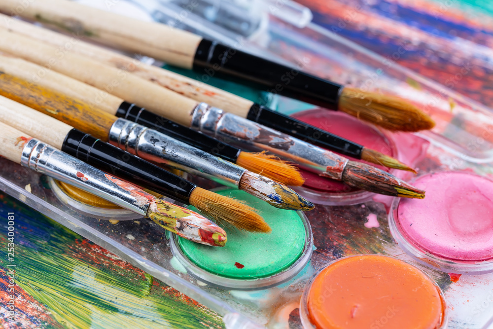 Fototapeta premium Paint brushes and paints for drawing.